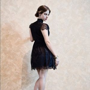 Witchy black lace cap sleeve dress